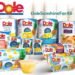 Assorted Dole fruit bowls, canned fruit, and juice products displayed together