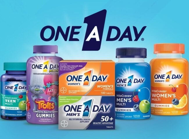 Promotional graphic featuring One A Day vitamins, Flintstones vitamins, and related multivitamin products with a 40% coupon offer.