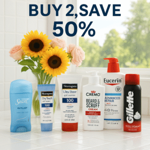 A bright and airy tiled bathroom with a summery feel, featuring sunflowers and roses on the counter alongside various household cleaning products: Mrs. Meyer’s Clean Day, Method All-Purpose Cleaner, Sparkle Paper Towels, and OxiClean MaxForce Stain Remover. The bathroom space has natural light streaming through, giving it a fresh and inviting look.