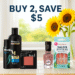 A sunny, breezy bathroom counter scene featuring AXE body spray, TRESemmé hair care, Maybelline blush, and Sally Hansen nail products arranged beside a white vase of sunflowers on a tiled surface.