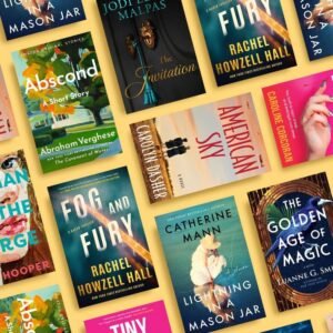 Stack of colorful books on a picnic blanket in the summer sun, with iced coffee, sunglasses, and a title that reads “Amazon First Reads – July 2025 – Chill Out With a Free Book”