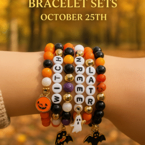 Colorful stack of Halloween beaded bracelet sets with ghost, pumpkin, and bat charms in orange, black, purple, and gold tones.