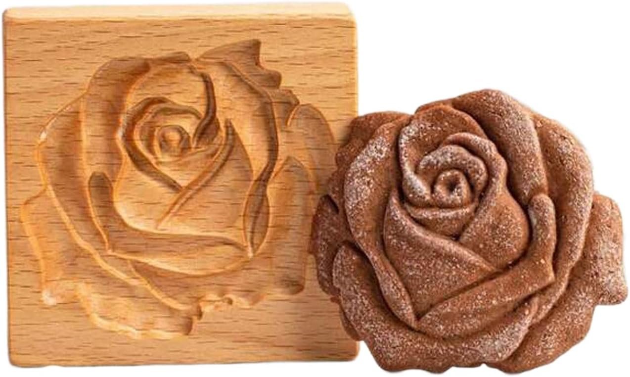 AEGYPIUS Wooden Cookie Mold with engraved rose design on dough, ready for baking