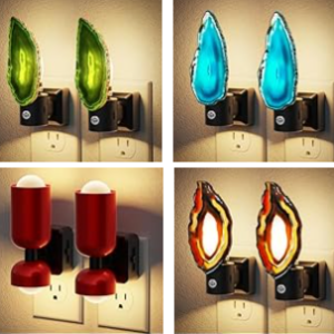 Plug-in agate crystal style night lights illuminated against a wall.