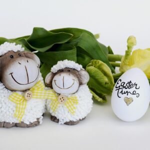 Spring lamb with tulips representing Easter and seasonal spring celebrations.