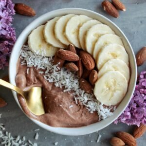 Healthy smoothie bowl with fruit representing protein shake and nutrition smoothie ingredients.
