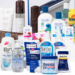 Beauty and personal care products including body lotion, skincare, mascara, lip balm, hair brushes, and hair color.