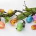 A bright spring-themed promotional image featuring Easter candy, toys, and basket fillers with soft seasonal colors and festive elements designed to highlight savings and mix-and-match deals.