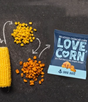 Love Corn crunchy snack products featured in a Daily Deal Busters grocery savings promotion.
