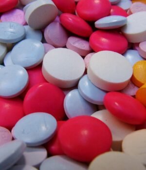 Vitamins, probiotics, supplements, and wellness essentials arranged for practical household stock-ups