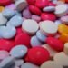 Vitamins, probiotics, supplements, and wellness essentials arranged for practical household stock-ups