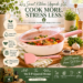 The CAROTE sauté pan sits on a clean white stove filled with colorful vegetables and a healthy family meal in progress. Fresh herbs, lemons, a wooden cutting board, linen towels, and a vase of flowers create a warm, aspirational atmosphere.