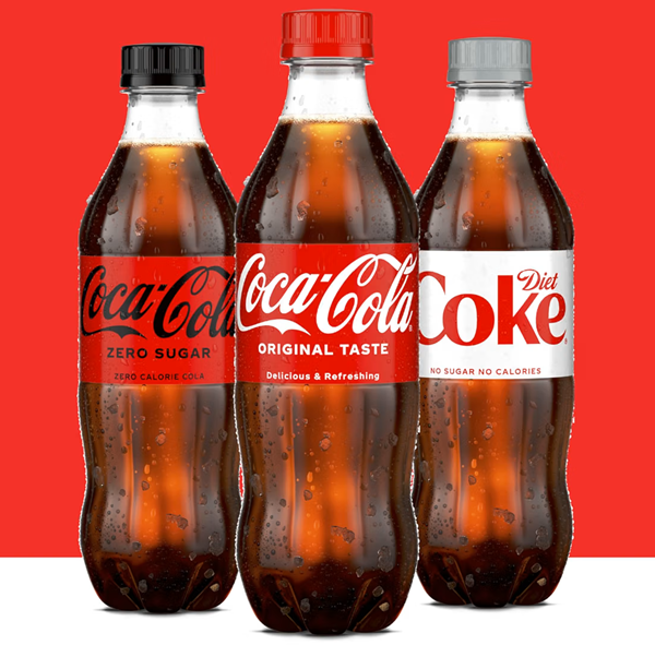 Coca-Cola bottled soda products featuring classic cola branding and assorted beverage varieties.