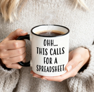Funny 11oz spreadsheet coffee mug with the phrase “Oh This Calls For A Spreadsheet” printed on the ceramic cup.
