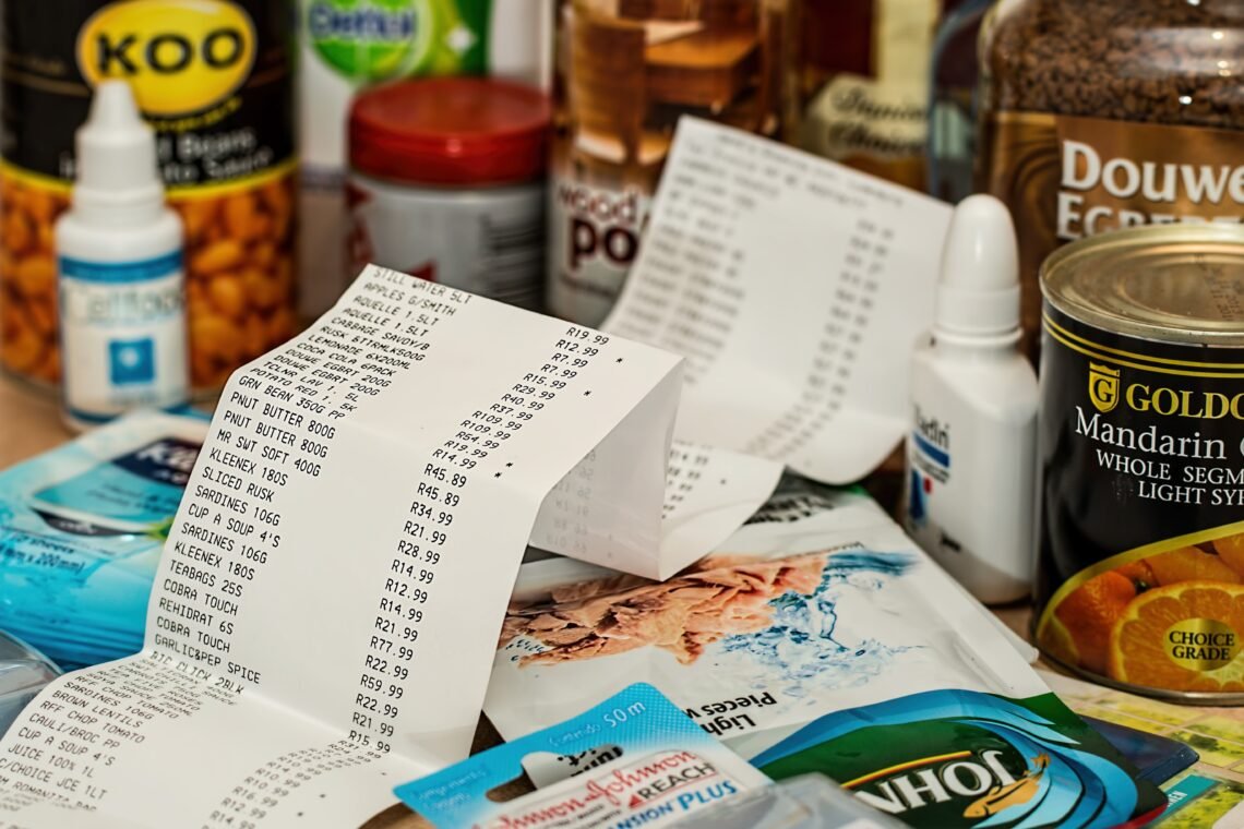 Grocery receipts spread across pantry staples and household purchases.