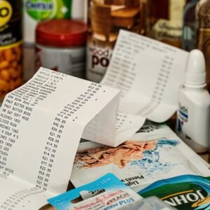 Grocery receipts spread across pantry staples and household purchases.