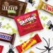 Mars Halloween candy variety featuring assorted colorful candy packages and Halloween-themed treats.