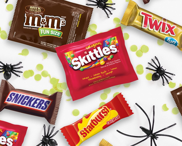 Mars Halloween candy variety featuring assorted colorful candy packages and Halloween-themed treats.